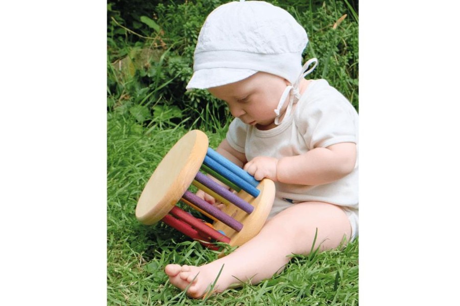 Montessori Materials Fire the Imagination | Grimm'S Giant Rolling Wheel With Wooden Beads And Bells